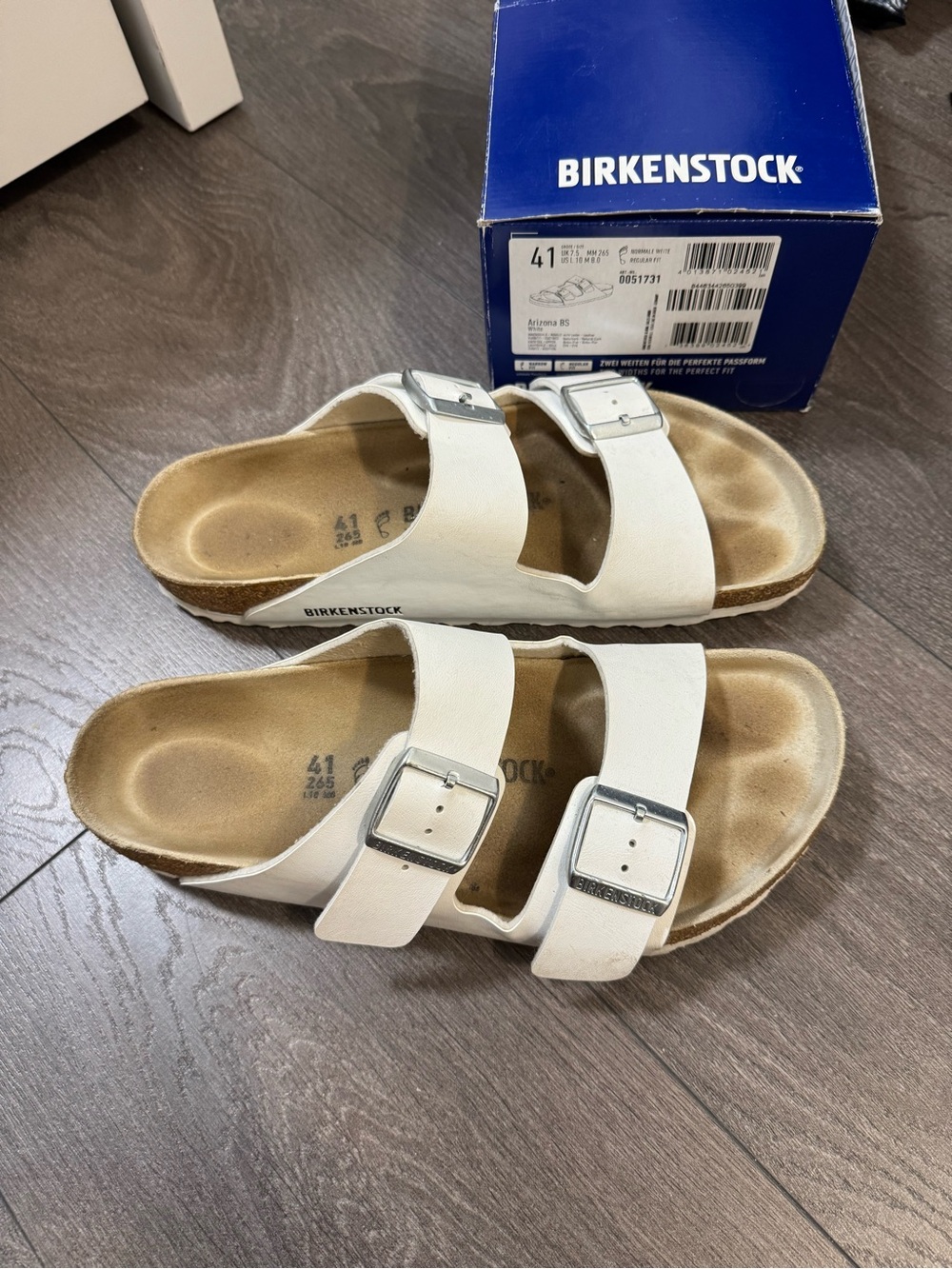 Birkenstock White Arizona Two-Strap Sandals with Silver Buckles